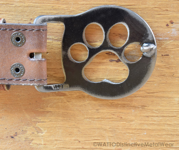 black belt with a buckle in the form of brass knuckles Stock Photo